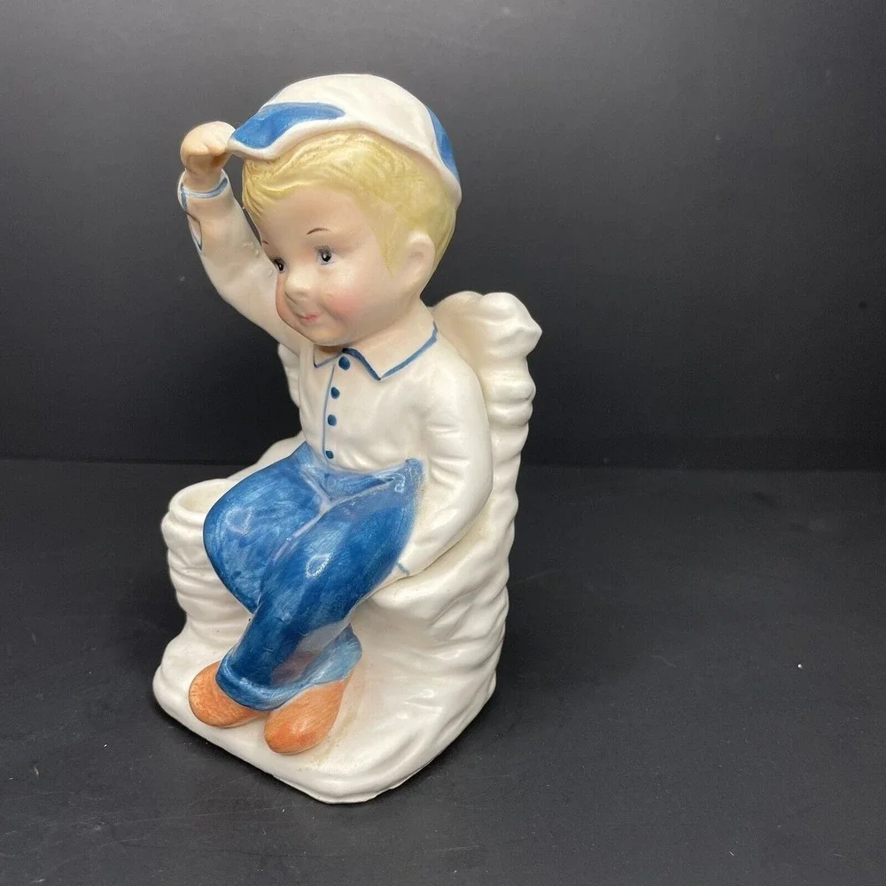 Vintage Boy Wearing Cap Saluting & Sitting Cross‎ Legged Bud Vase White & Blue